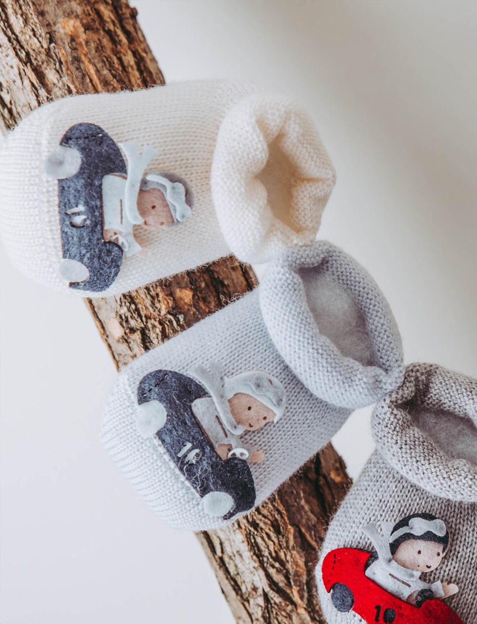 Wool baby booties with toy car 